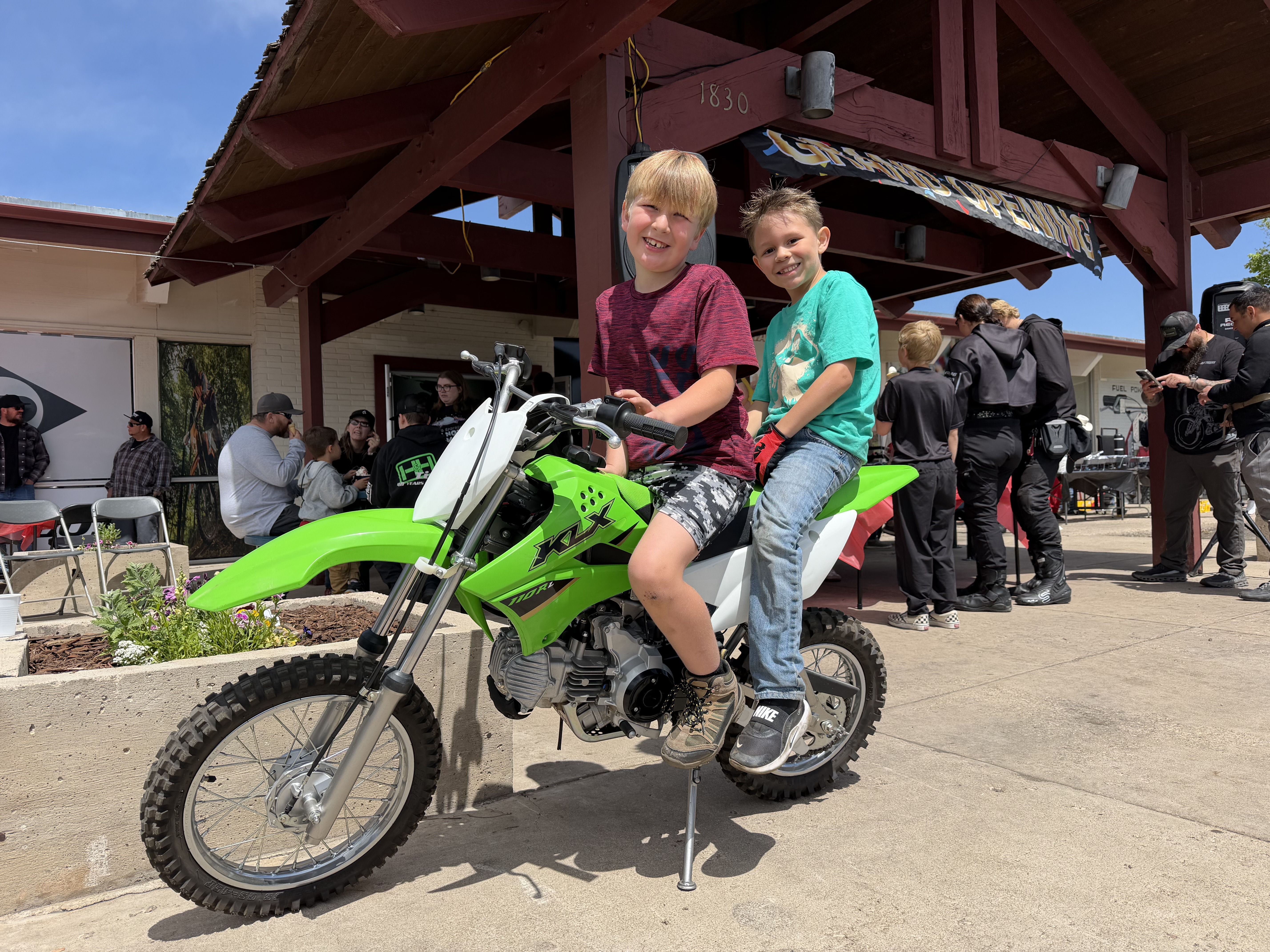 Dreams come true 7 year old boy that won the kx110 at Fuel Powersports Grand Reopening